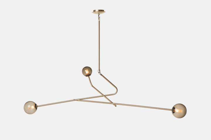 BRUSHED BRASS AND GREY GLASS